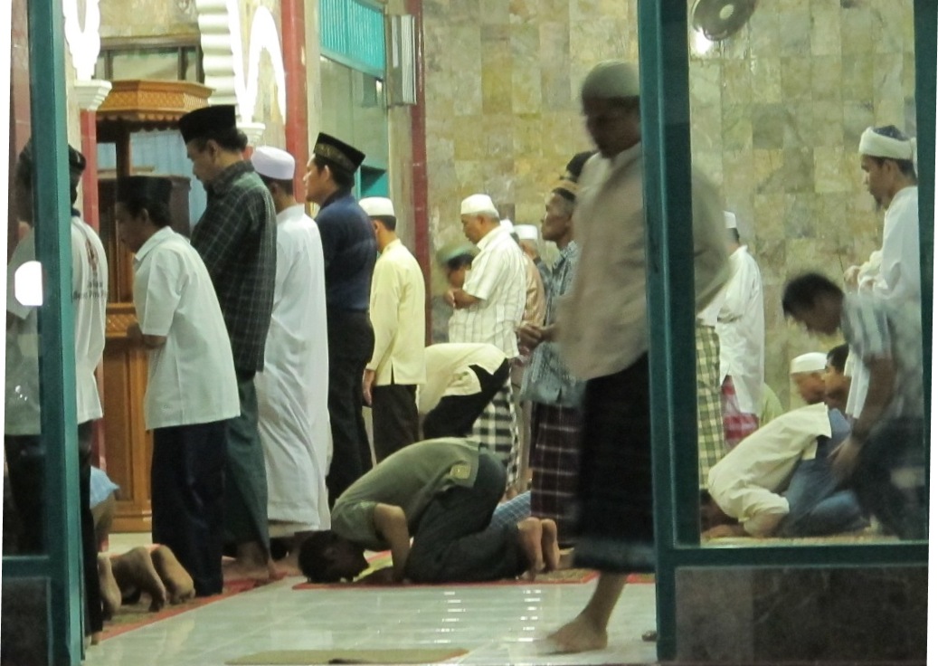 Men praying at the mosque, Sumatra